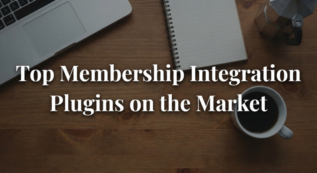 Flat lay image of a laptop, notebook, coffee cup, and espresso maker on a wooden desk, with the text "Top Membership Integration Plugins on the Market," highlighting the best membership integration plugin options.